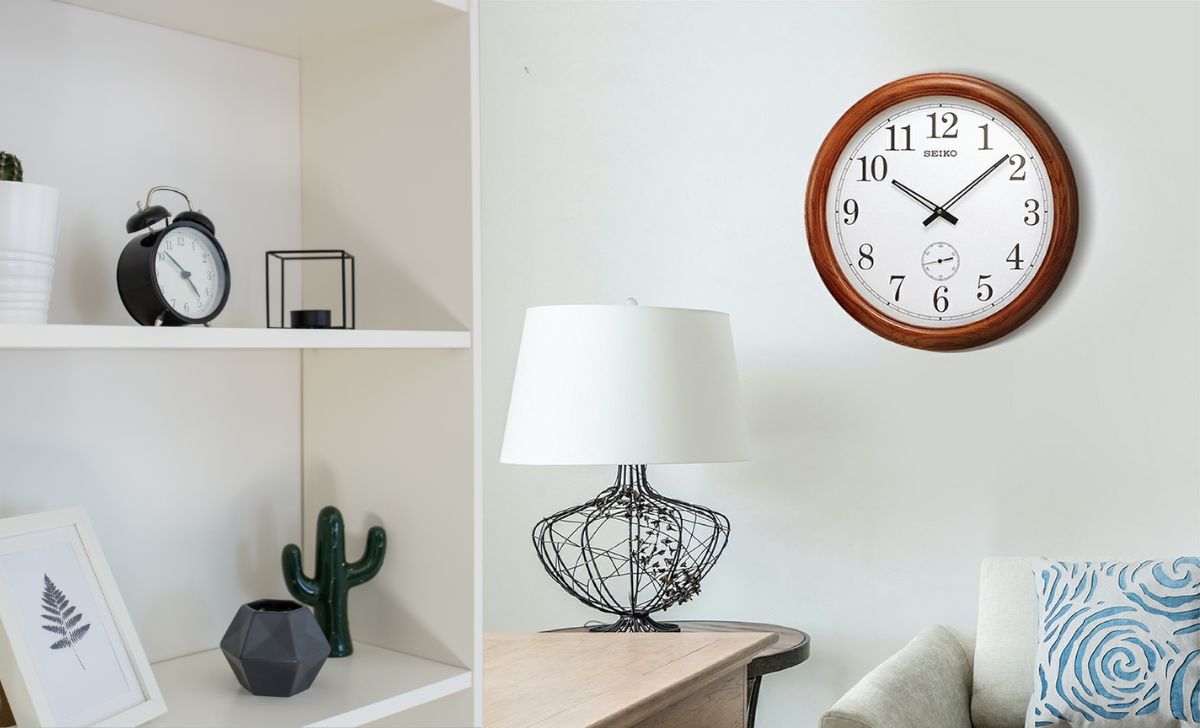 10+ mẫu đồng hồ treo tường trang trí phòng khách hợp mệnh phong thủy 1 đồng hồ treo tường Seiko QXA155B